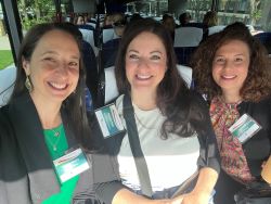 Participants of NASW advocacy pose together on a bus