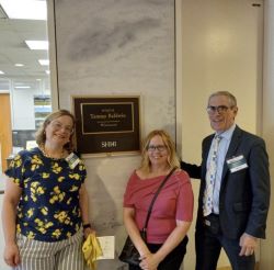 NASW Advocacy Day participants stand in front of Tammy Baldwin's office