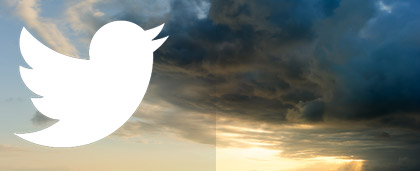 Twitter logo with clouds