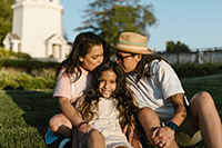 native american family embracing