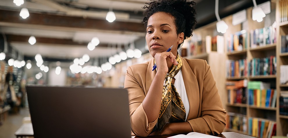 woman looking at computer