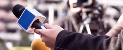 reporter with a microphone in hand