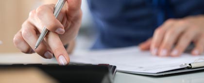 woman using calculator