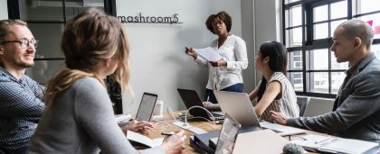 meeting with a woman sharing at a board