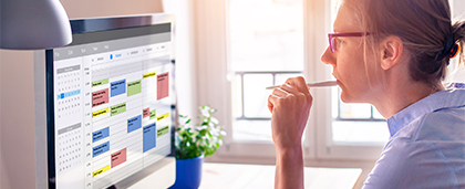 woman looking at a computer screen