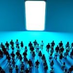 group of people walking toward giant phone