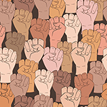 raised fists in various skin tones
