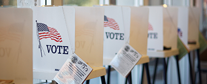 voting booth with flags