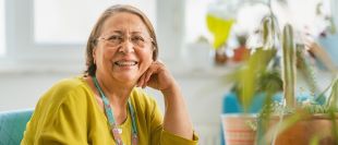 smiling woman at desk