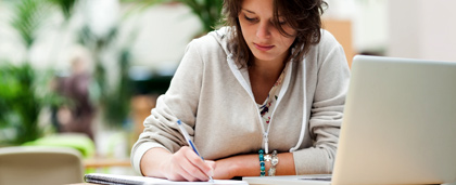 woman studying with laptop