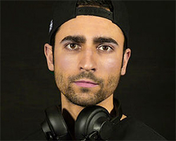 man with headphones around his neck
