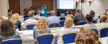 break out session room with attendees and speaker