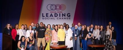 U.S. Sen. Debbie Stabenow, D-Mich., poses with Michigan attendees at NASW's 2024 national conference in Washington, D.C.