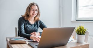 person looking at laptop