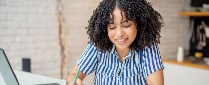 woman looking at laptop