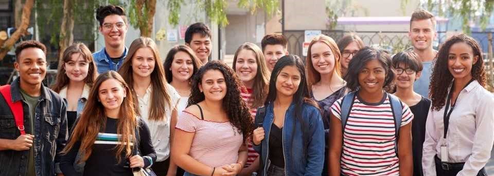 students smiling in group