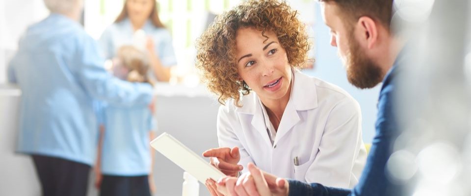 Doctor speaking with a patient