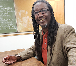 Michael Sinclair in a classroom