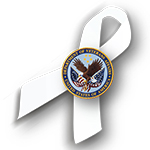 white ribbon with government seal