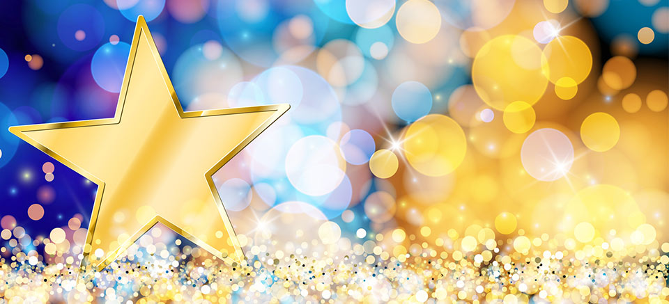 gold star surrounded by sparkly circles