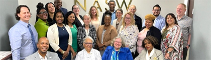 board members standing in a row