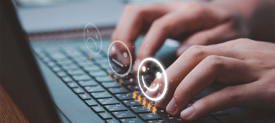 hands typing on a keyboard