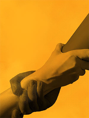 two people's hands in a safety grip