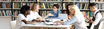 people study together in a library