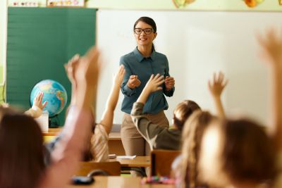 teacher in front of classroom