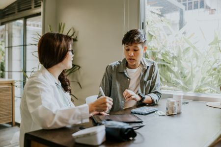 2 people sitting at a table
