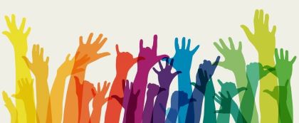 Hands raised colored like the rainbow